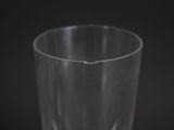 a close up shot of a glass of water on a black background