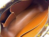 an image of a louis vuitton bag with a zipper open