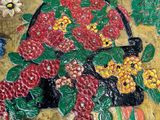 a picture of a painting of a woman with flowers on it