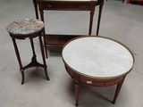 two tables and two stools in a room with a lot of furniture