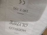a box of toilet paper wrapped in plastic on the floor