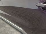 a close up of a car door handle and a door handle