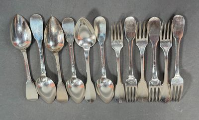 a lot of silver spoons and forks on the table