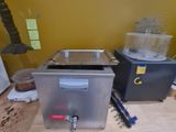 a kitchen counter with a sink and a toaster on it