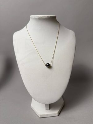 PORCHET, Collier en or jaune 750/°° (18k) sertissant une per…