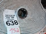 a roll of fabric on a shelf with a price tag