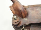 a saddle that is sitting on top of a stool