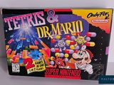 a box of tetris and dr mario on the table