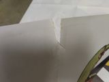 a piece of paper that has been torn off of it