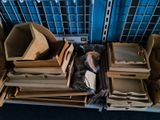 many boxes and boxes of cardboard on the floor
