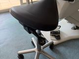 a chair that is sitting in the middle of a room