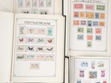 a lot of different stamps on the pages of a book