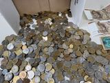a box full of coins sitting on a table