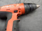 a drill that is sitting on a table