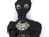 a figurine of a man with a crown on his head