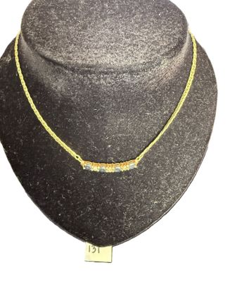 1 collier en or jaune 18 K (750°/°°) serti de saphirs et dia…