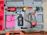 a tool kit in a plastic case on the floor