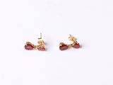 boucles d'oreilles plaquées or ornées de grenats