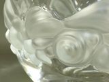a clear glass bowl with a motorcycle design on it