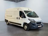 a picture of a white van parked in a room