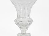 a clear glass vase sitting on top of a table