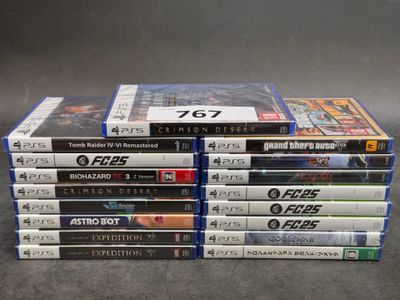 several video games stacked on top of each other on a table
