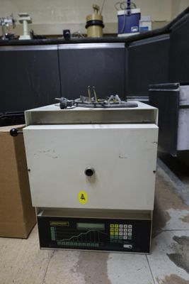 an image of a kitchen with a sink and a box