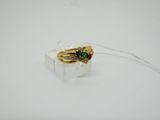 a ring that is sitting on top of a clear box