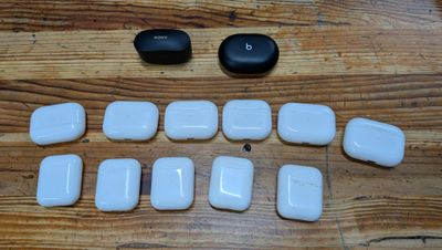 a wooden table that has a bunch of white objects on it
