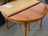 an image of a table with a wooden top in a room