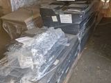 a lot of boxes of computer equipment sitting on a table
