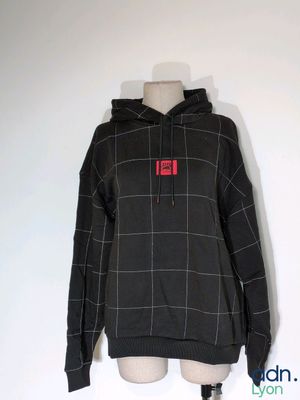 black and white plaid hoodie with red number 11 on the front