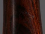 close up of a close up of a wooden handle on a cane