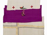 a close up of a purple and white cloth with a cross on it