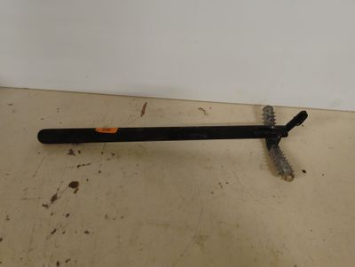 an image of a hammer on the floor next to a white wall