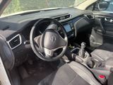 the interior of a car with a steering wheel, dashboard and dashboard controls