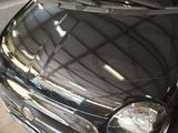 a picture of a car with a broken windshield