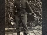 an old photo of a man wearing a gas mask