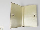 an open wallet with two buttons on the inside