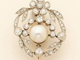an image of a pearl and diamond broochle