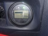 a close up of a car ' s dashboard with a clock on it