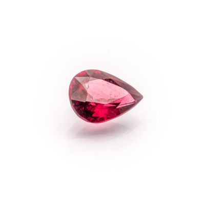 a pink tourmaline gems on a white background