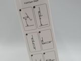 packaging for a sewing machine with instructions on the side of it
