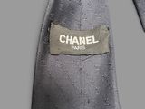 a label on a necktie that says chanel paris