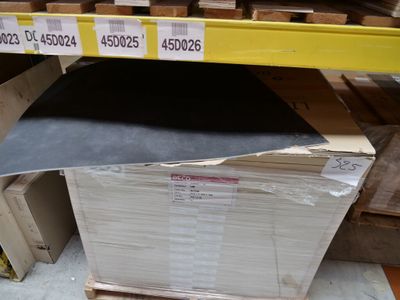 a stack of boxes on a pallet in a warehouse
