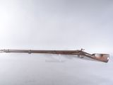 a rifle with a wooden barrel on a white background
