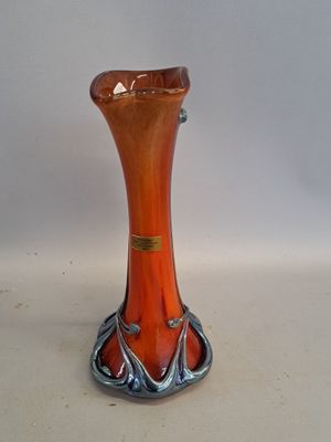 a glass vase that is sitting on a table