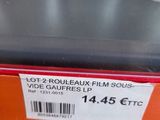 a lot of rolls of film sitting on a shelf
