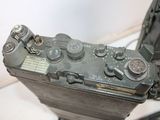 a close up of an old camera on a table