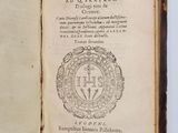 an open book with a picture of a coat of arms on it
